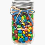 Raffia Bow Glass Mason Jar with M&M's®, 16oz.